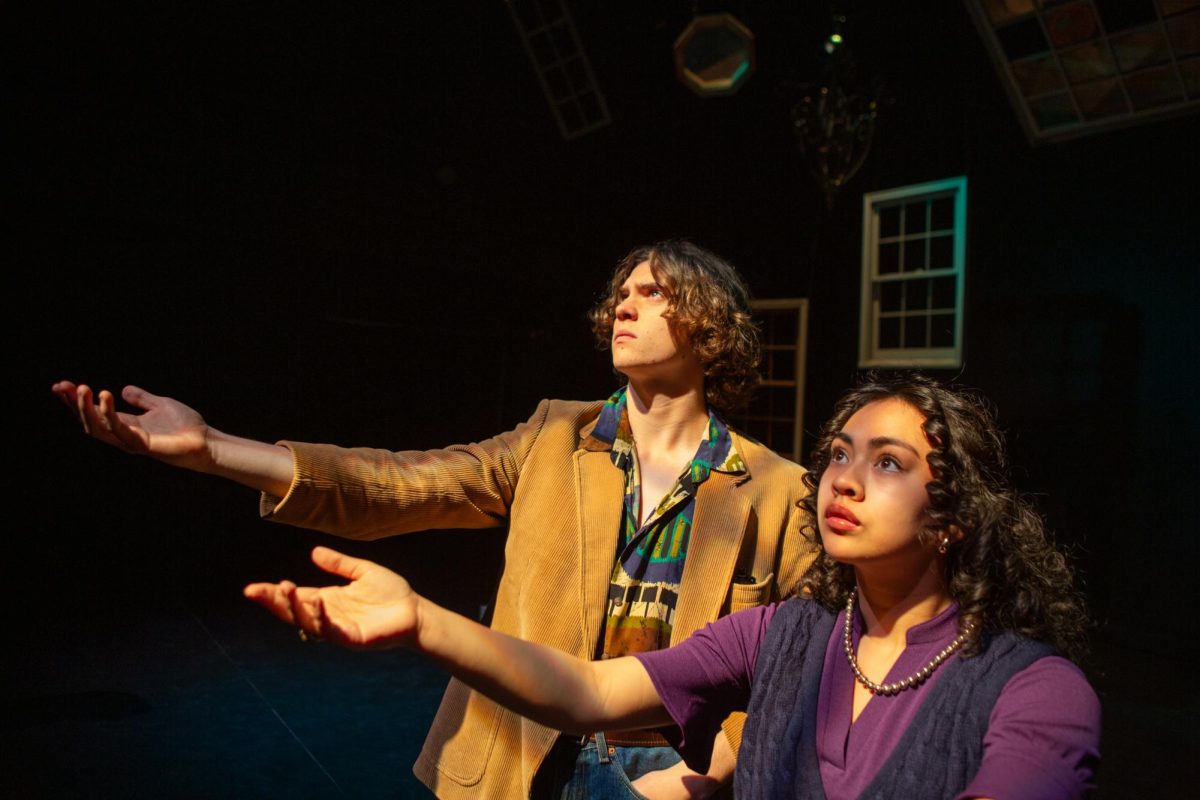 Zeke Jones as Lorenzo and Kennedy Ulat as Tilly perform a scene.