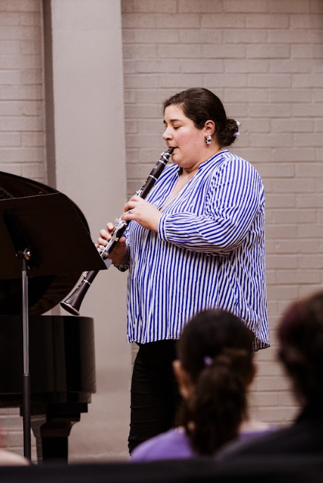 Dr. Kelsey Paquin, a clarinet professor at UNA, performs at the recital.